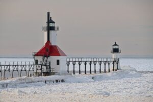 Powerful Waves Overpower Michigan Lighthouse Amid Winter Surge