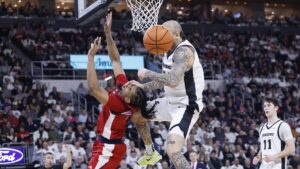 Providence Friars Face Formidable Defensive Challenge Against Big East Player of the Year Zuby Ejiofor