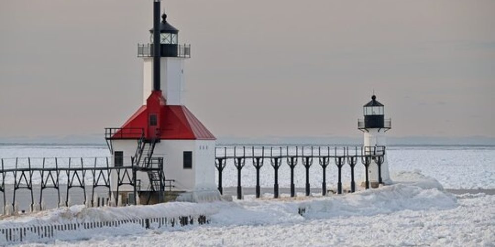 Powerful Waves Overpower Michigan Lighthouse Amid Winter Surge