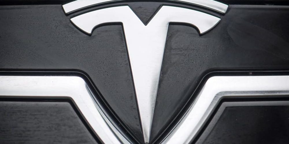 Tesla Defies Expectations with Revenue Beat Amid Delivery Slump